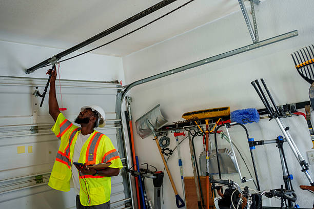 Professional Garage Door Panel Replacement technician working in Bowman County County, ND
